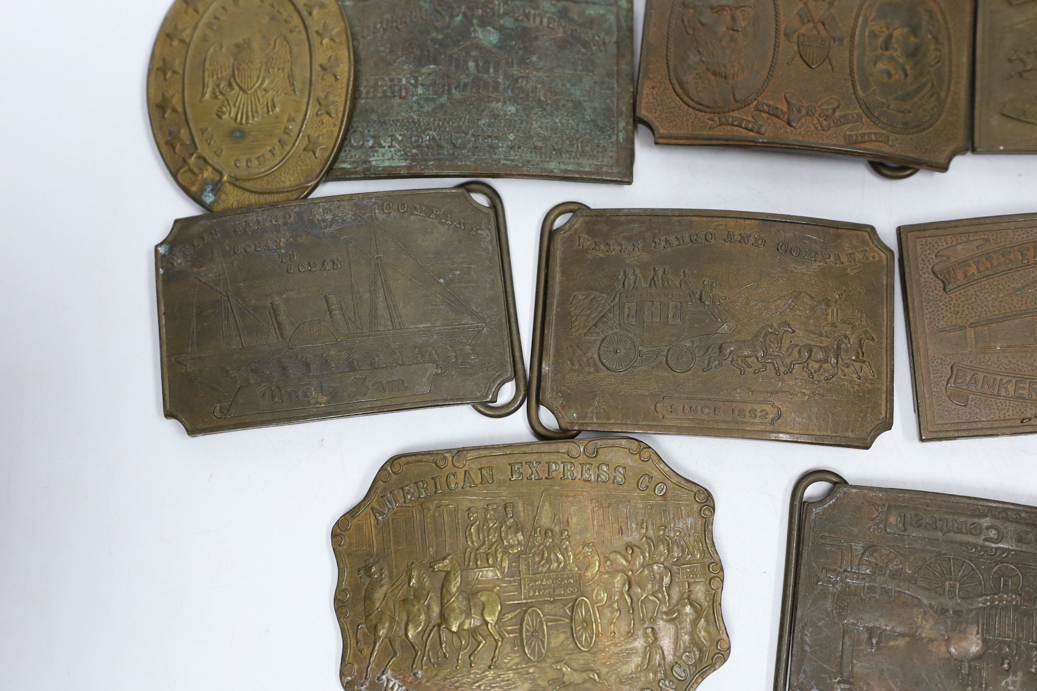 A collection of Wells Fargo and similar belt buckles, mostly by Tiffany & Co.